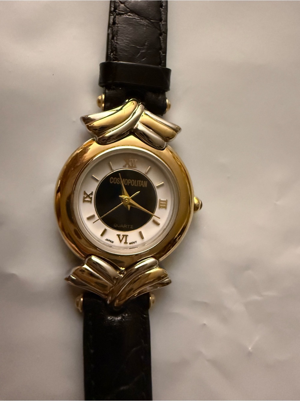 Cosmopolitan Gold and Black Leather Strap Dress Watch